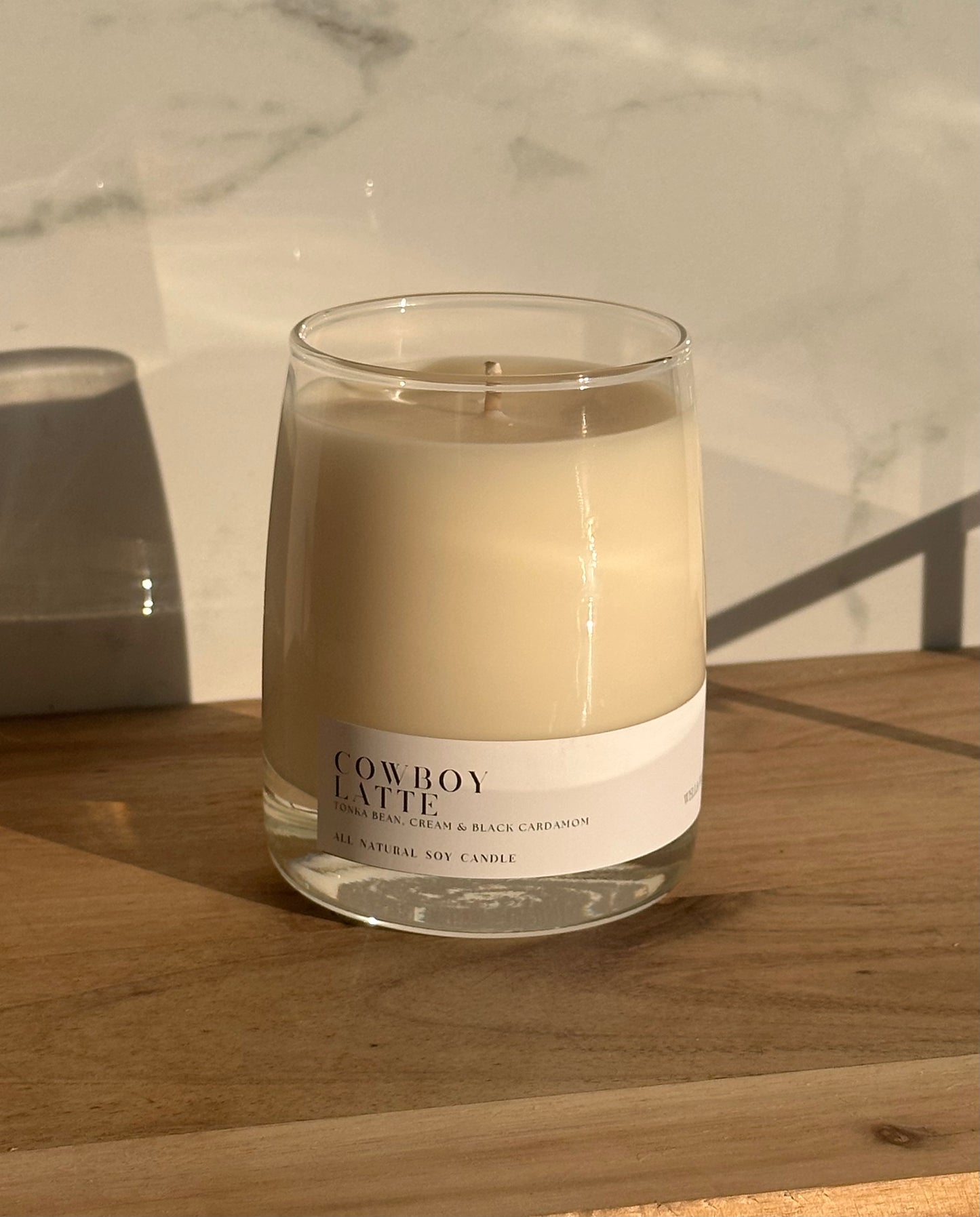 Cowboy Latte Soy Candle in a Clear Whiskey Glass Jar with White Label