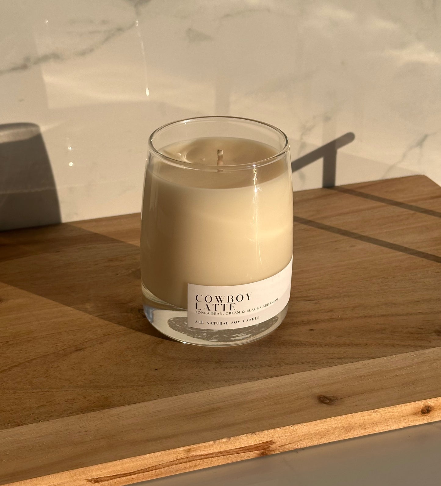 Cowboy Latte Soy Candle in a Clear Whiskey Glass Jar with White Label