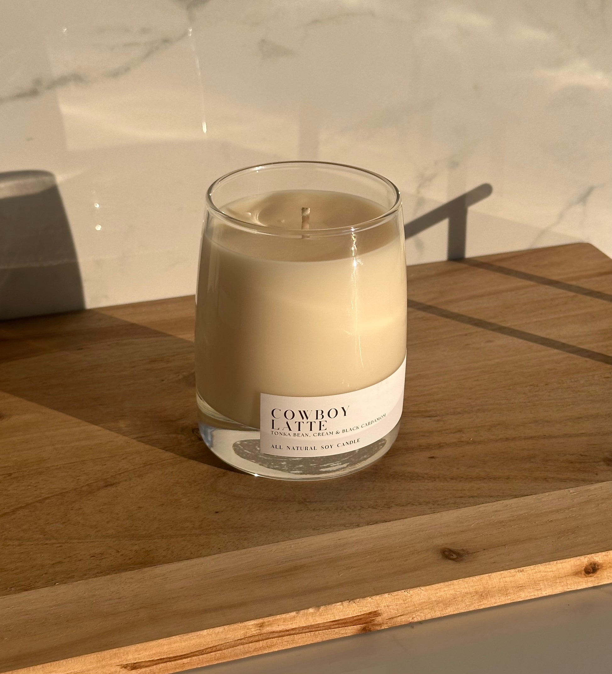 Cowboy Latte Soy Candle in a Clear Whiskey Glass Jar with White Label