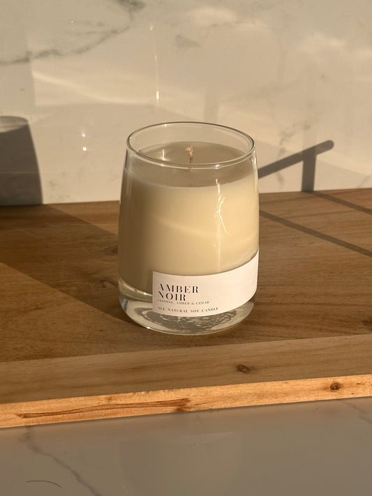 Amber Noir Soy Candle in a Clear Whiskey Glass Jar with White Label