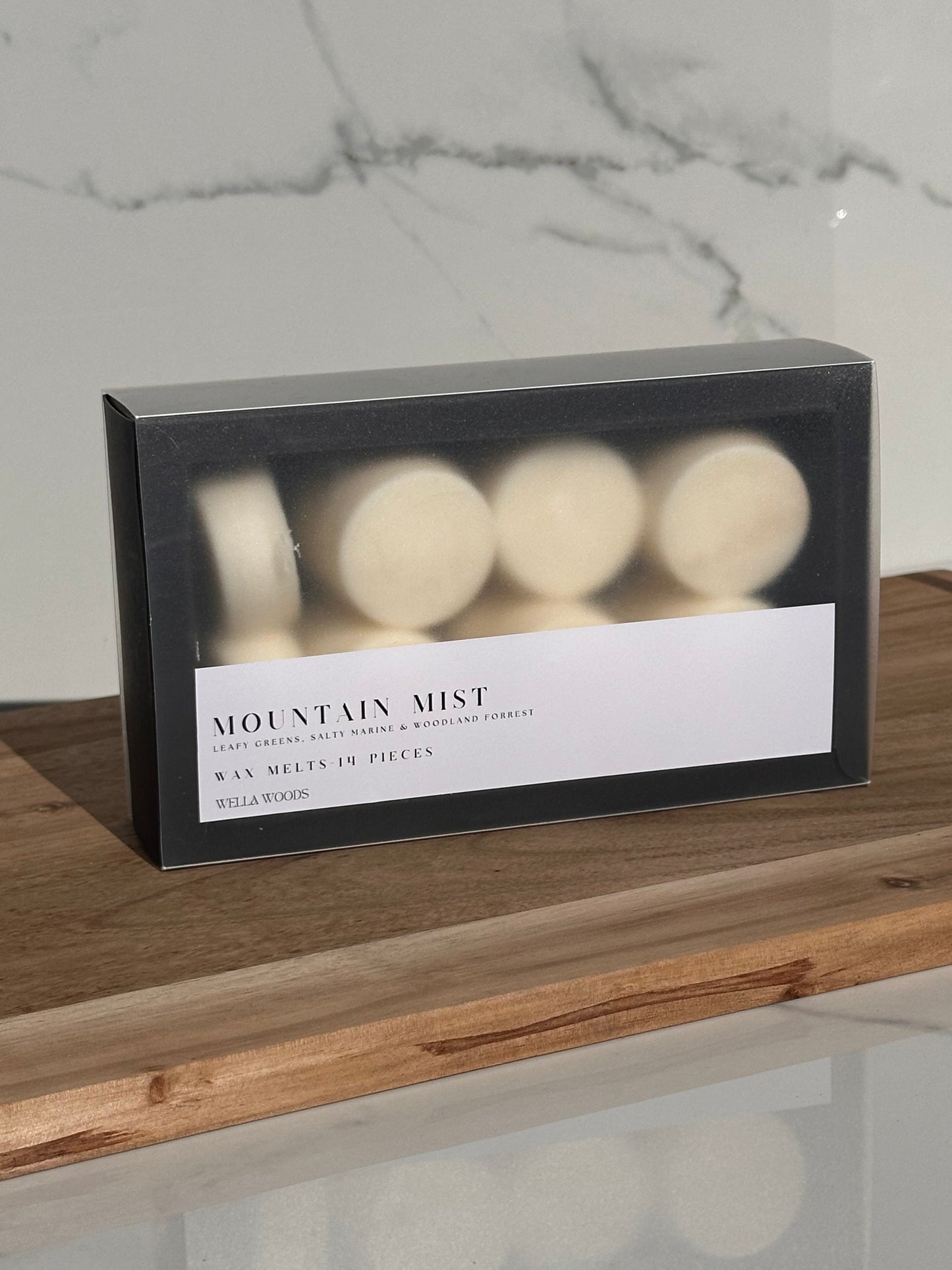 Mountain Mist Wax Melts in Black Cardboard box and transparent slider.