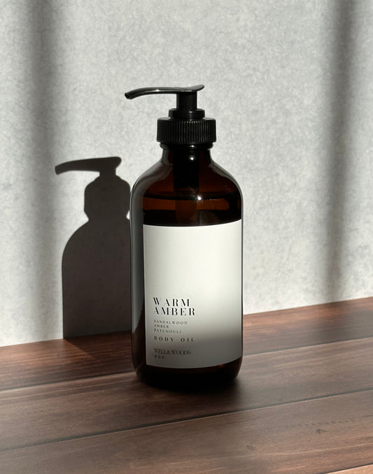 Warm Amber Body Oil in Amber Glass Bottle with Black Pump
