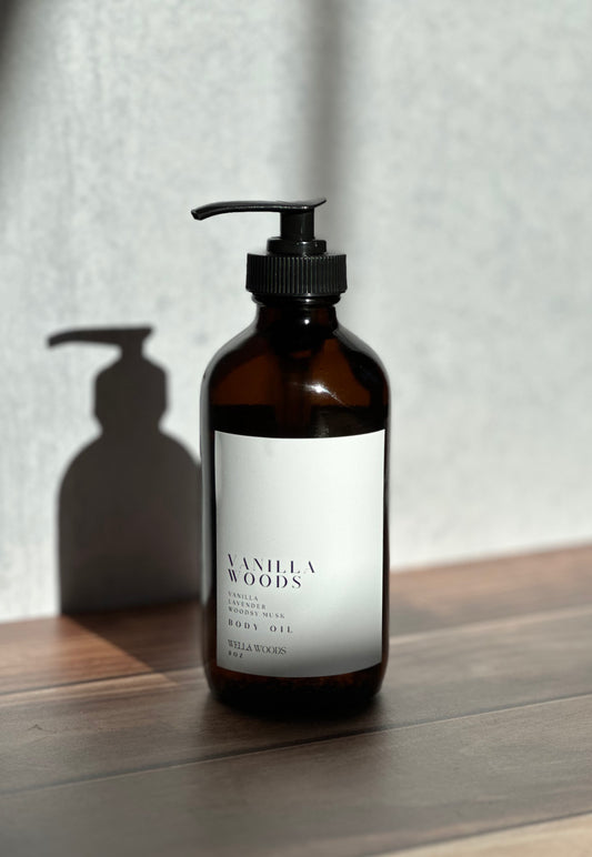 Vanilla Woods Body Oil in Amber Glass Bottle with Black Pump
