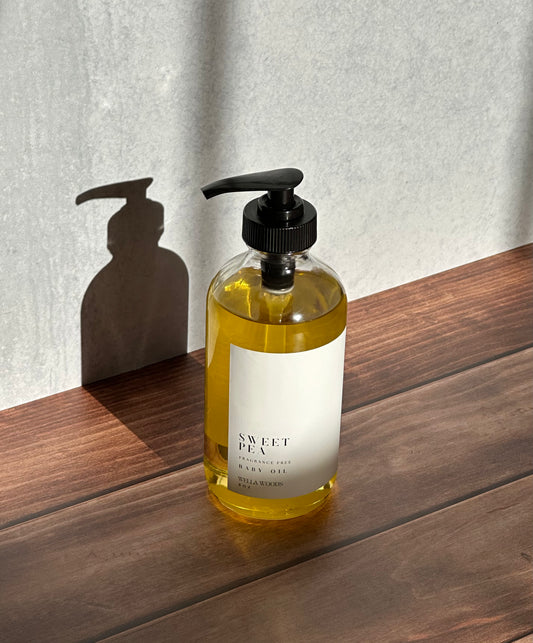 Sweet Pea Body Oil in Clear Glass Bottle with Black Pump