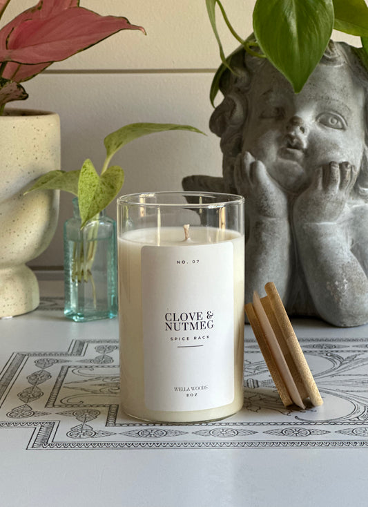 Clove & Nutmeg Soy Candle in clear Spice Rack Jar with Bamboo Lid and White Label.
